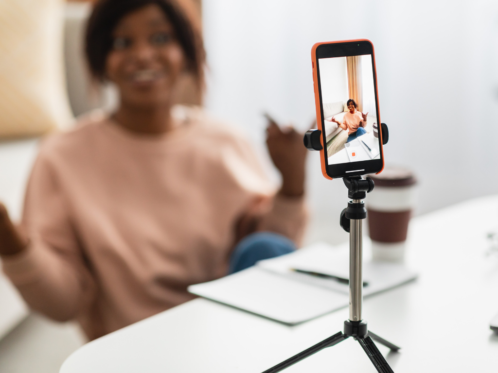 Woman creating video on phone.